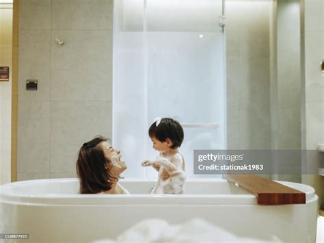 Mother and Son In a Bathroom